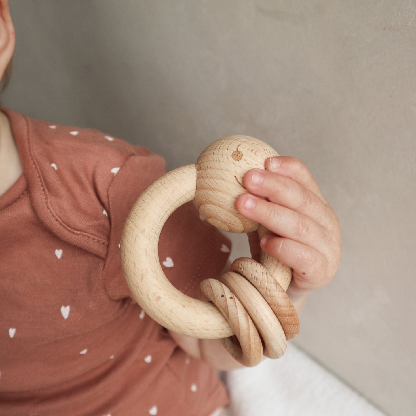 Happy face circle teething rattle