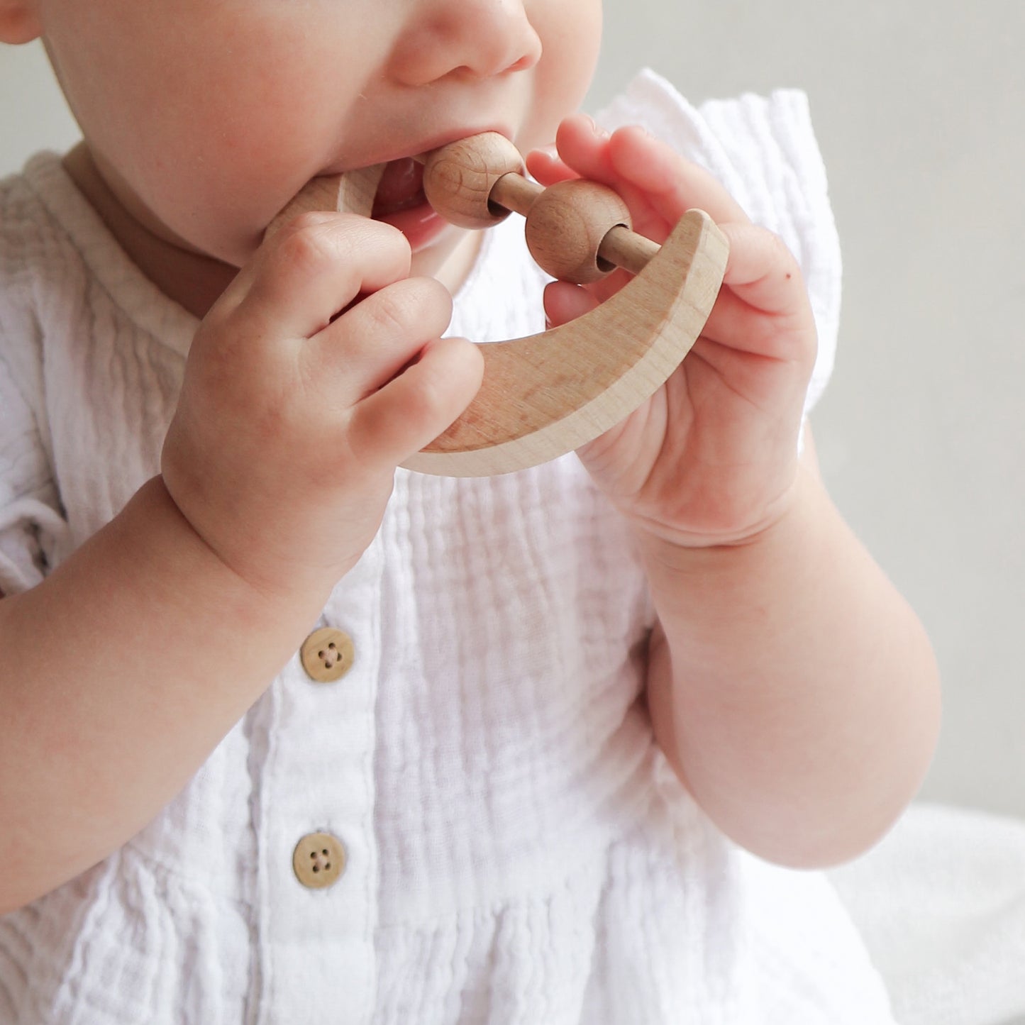 Wooden moon teething rattle