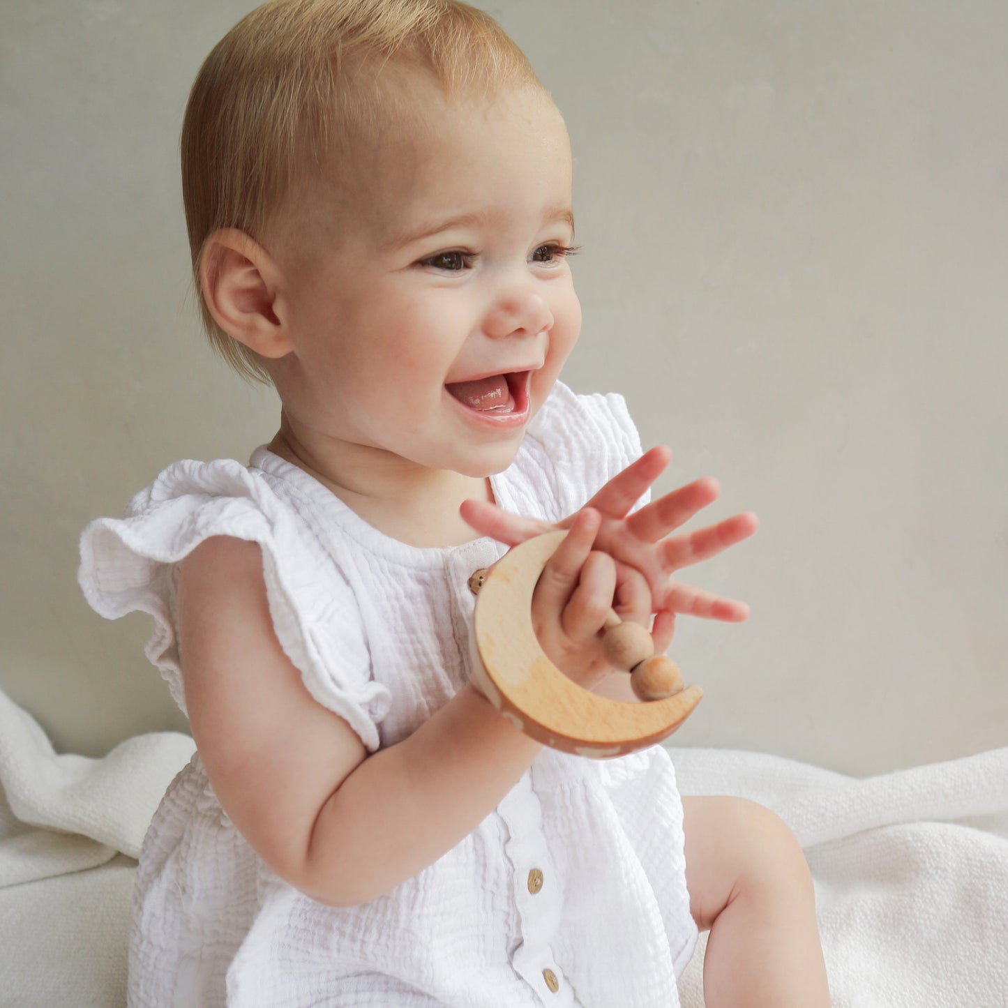 Wooden moon teething rattle