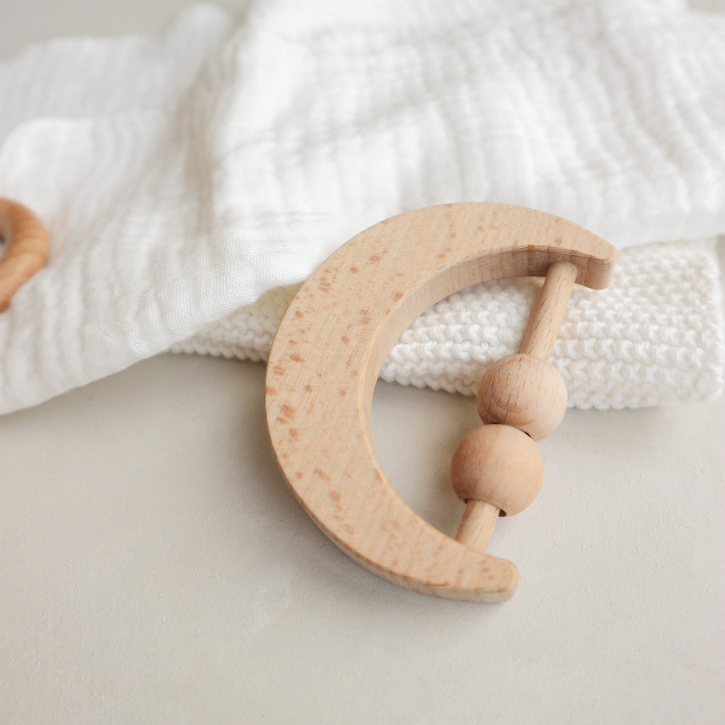 Wooden moon teething rattle